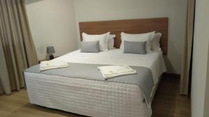 Ένα ή περισσότερα κρεβάτια σε δωμάτιο στο Amazon Seasons hotel