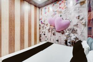 Ένα ή περισσότερα κρεβάτια σε δωμάτιο στο SPOT ON The Yeble Hotel And Restaurant