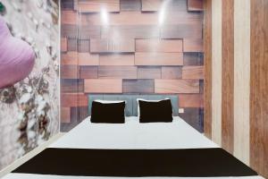 Ένα ή περισσότερα κρεβάτια σε δωμάτιο στο SPOT ON The Yeble Hotel And Restaurant