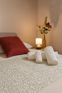 Postel nebo postele na pokoji v ubytování Madonnina House Bilocale vicino Milano, Rho Fiera e H Galeazzi