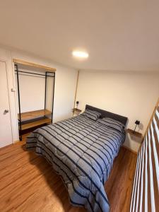 En eller flere senge i et værelse på Casa Tony Natales