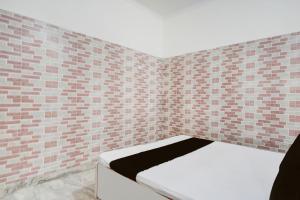 Ένα ή περισσότερα κρεβάτια σε δωμάτιο στο Hotel O prream view