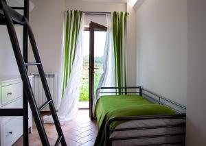 
A bed or beds in a room at Agriturismo Sensi
