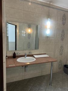 Ένα μπάνιο στο Номера в уютном отеле Sofia-Promenade