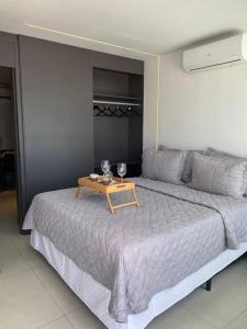 Ένα ή περισσότερα κρεβάτια σε δωμάτιο στο Porto 2 Life - Apartmento em Muro Alto +23 φωτογραφίες