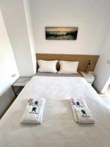 Ένα ή περισσότερα κρεβάτια σε δωμάτιο στο Perla de Mar