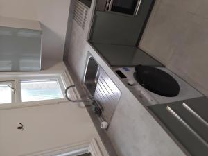 Η κουζίνα ή μικρή κουζίνα στο Well furnished rooms