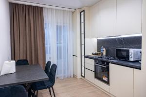 Η κουζίνα ή μικρή κουζίνα στο Fine Luxury