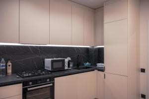 Η κουζίνα ή μικρή κουζίνα στο Fine Luxury +14 φωτογραφίες