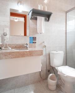 Koupelna v ubytování Hotel Bertoluci + 28 fotografií