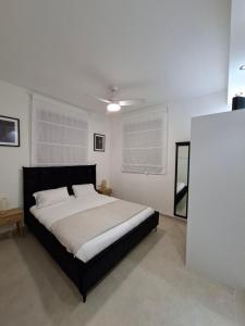 Ένα ή περισσότερα κρεβάτια σε δωμάτιο στο K Home 2