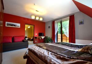 Postel nebo postele na pokoji v ubytování Willa Zarębek