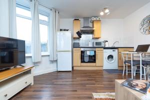 Una cocina o cocineta en Urban Nest