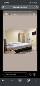 Ένα ή περισσότερα κρεβάτια σε δωμάτιο στο Qala Motel