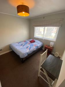 Ένα ή περισσότερα κρεβάτια σε δωμάτιο στο Habitación Doble con Baño Exclusivo, Entorno Tranquilo y Servicios Cercanos