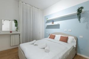 Ένα ή περισσότερα κρεβάτια σε δωμάτιο στο Luxury Apartment Near Milan - 6 Guests - Metro M2