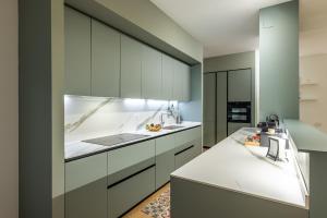 Kuchyň nebo kuchyňský kout v ubytování Luxury Apartment Near Milan - 6 Guests - Metro M2 + 34 fotografií