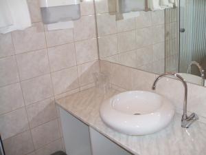 Kúpeľňa v ubytovaní Lugas Hotel