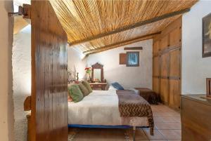 Una cama o camas en una habitación de Can Pavet 23 fotos más