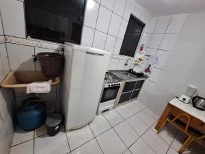 Η κουζίνα ή μικρή κουζίνα στο Sossego 2 +1 φωτογραφίες