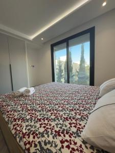 Postel nebo postele na pokoji v ubytování apartment lac 2