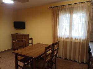 Μια τηλεόραση ή/και κέντρο ψυχαγωγίας στο Casa Diego Apartamentos Turisticos