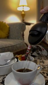 Băuturi la Great Greece Le Convivial Suites