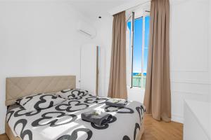 Voodi või voodid majutusasutuse 2P Central & Quiet in Cap d 'Ail toas