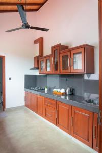 Η κουζίνα ή μικρή κουζίνα στο Villa Paddy Breeze