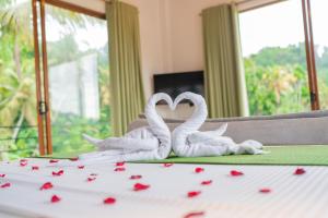 Ένα ή περισσότερα κρεβάτια σε δωμάτιο στο Villa Paddy Breeze +81 φωτογραφίες