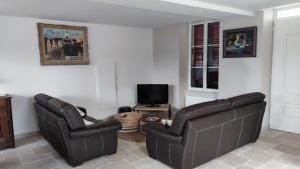 Χώρος καθιστικού στο Gite De L'Aeti - SPA prive - Piscine - Vignoble