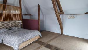 Ένα ή περισσότερα κρεβάτια σε δωμάτιο στο Gite De L'Aeti - SPA prive - Piscine - Vignoble +10 φωτογραφίες