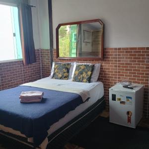 Postel nebo postele na pokoji v ubytování Pousada Marambaia Café - Praiana, econômica, Com café da manhã, piscina ao ar livre e hidromassagem aquecida -Frente para o mar + 60 fotografií