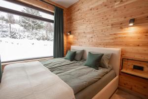 Ένα ή περισσότερα κρεβάτια σε δωμάτιο στο Яблуневий схил