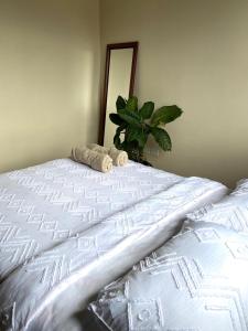 Ένα ή περισσότερα κρεβάτια σε δωμάτιο στο Apartment l Private Terrace l By Easy Stay