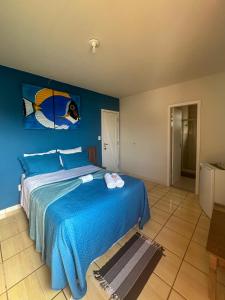 Ένα ή περισσότερα κρεβάτια σε δωμάτιο στο Buena Onda Suites