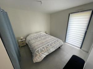 Ένα ή περισσότερα κρεβάτια σε δωμάτιο στο Maison spacieuse, centre sarzeau