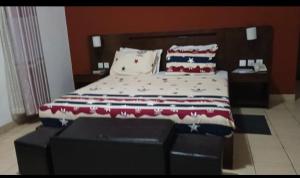 Ένα ή περισσότερα κρεβάτια σε δωμάτιο στο Hampton Resorts