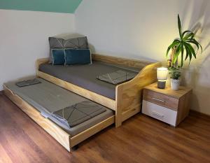 Ένα ή περισσότερα κρεβάτια σε δωμάτιο στο Apartment with garage and garden +15 φωτογραφίες