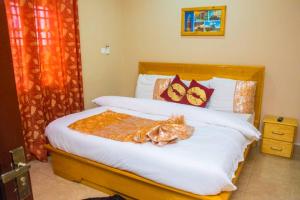 Ένα ή περισσότερα κρεβάτια σε δωμάτιο στο feel at home two bedrooms