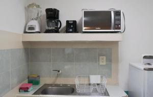 Η κουζίνα ή μικρή κουζίνα στο Studios Yaxkin, located in downtown