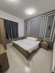 Ένα ή περισσότερα κρεβάτια σε δωμάτιο στο Furnished 1bhk with all needs