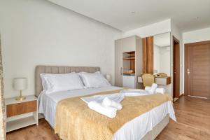 Ένα ή περισσότερα κρεβάτια σε δωμάτιο στο Aqua Lounge Aparthotel Ulcinj