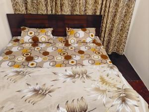 Ένα ή περισσότερα κρεβάτια σε δωμάτιο στο MiRACLE HOMESTAY