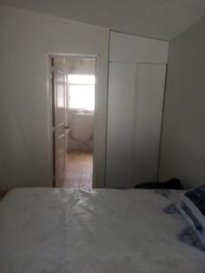 Un pat sau paturi într-o cameră la Casa fin de semana en Cuernavaca Morelos