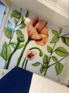 Ένα ή περισσότερα κρεβάτια σε δωμάτιο στο Casa ao mar -Pousada Itapema