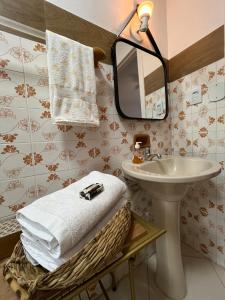 Galería fotográfica de Cantinho Ítalo-Germânico Hospedagem - Suíte Girassol - Centro, Marechal Floriano-ES en Marechal Floriano