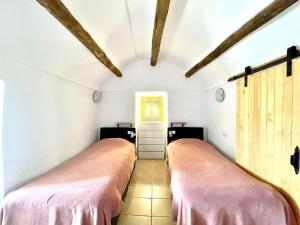 Ένα ή περισσότερα κρεβάτια σε δωμάτιο στο Cave Houses Ed, Yara and Nadieh with PRM facilities +33 φωτογραφίες