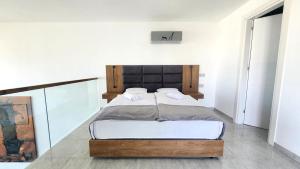 Postel nebo postele na pokoji v ubytování Idyll Homes THE PENTHOUSE + 44 fotografií