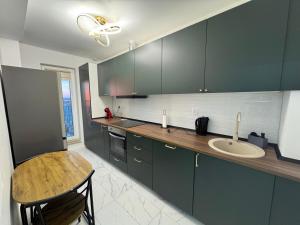 Η κουζίνα ή μικρή κουζίνα στο Luna Place